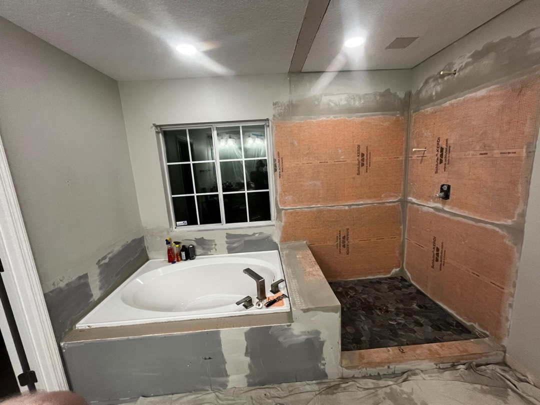 Schluter KERDI waterproofing on shower walls, KV Tileworks